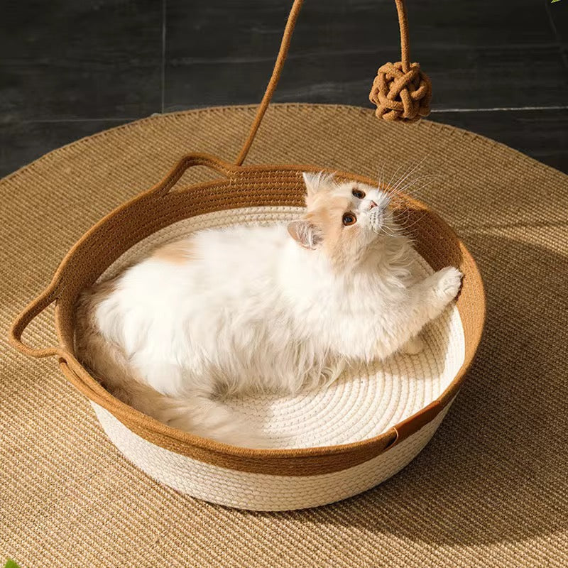 Cat scratcher bed with a toy